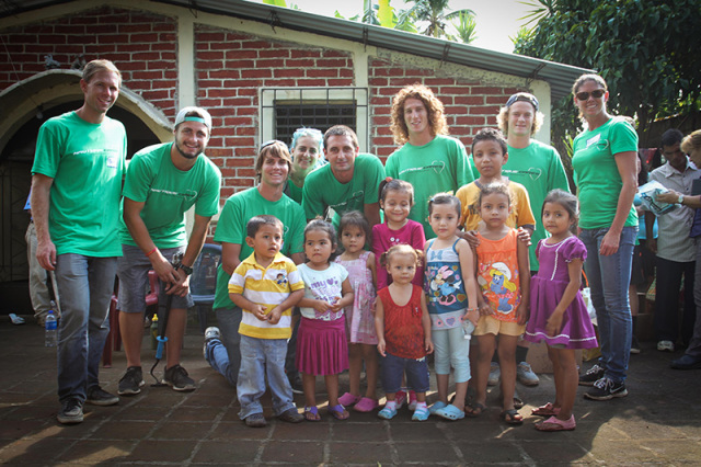 Team Nautique athletes serving a community in El Salvador